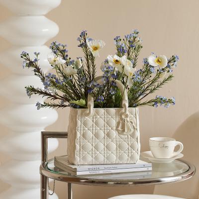 Popular creative luxury home decoration Sculpture Flower Vase Resin Craft vase Handbag vase